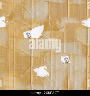 Seamless 4k photo texture of folded and used cardboard paper with torn post stickers and stains. Stock Photo