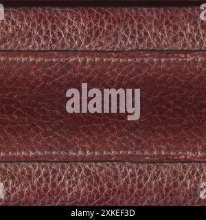 Seamless 4k photo texture photo of red colored stitched leather material. Stock Photo