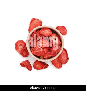 Bowl with tasty freeze-dried strawberry on white background Stock Photo