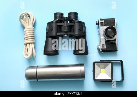 Composition with travel items on blue background Stock Photo