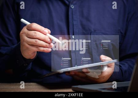 The user points to a folder at the virtual screen to work. Storing corporate work data in the online cloud. Database management for paperwork to paper Stock Photo