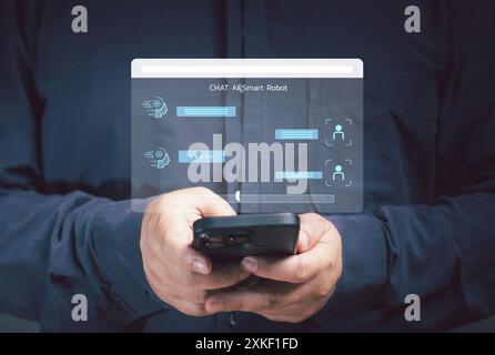 A man show the AI chat to order tasks with AI to perform a variety of tasks in his hand. ai conversation for innovation artificial intelligence. futur Stock Photo