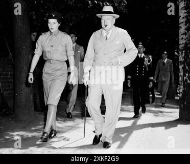 A photo showing the ATS (Auxiliary Territorial Service) in action. It was formed on 9 September 1938, initially as a women's voluntary service, and existed until 1 February 1949, when it was merged into the Women's Royal Army Corps. This image shows Mary Churchill with her father, the Prime Minister Winston Churchill. The photo was taken at the 1945 Potsdam conference and Mary is in the ATS uniform. Stock Photo