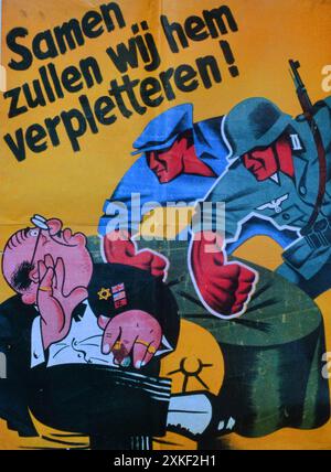 Propaganda poster of 27th SS Volunteer Division Langemarck with antisemitic title: 'Together we will crush him!'. This SS Division was made up of volunteers from Flemish Belgium. It depicts a soldier and a civilian worker threatening a businessman whose jacket shows the star of david with the US, UK and Soviet flags. Stock Photo