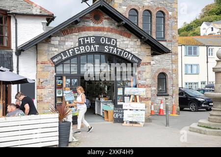 The Old Lifeboat Station on the quay in the Cornish town of Looe, now an open art studio and souvenir gift shop, England,UK,2023 Stock Photo