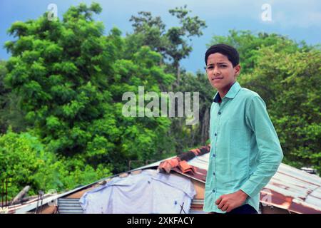 an indian school boy giving pose in their dress Stock Photo