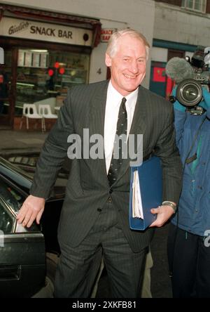 File photo dated 09/02/94 of Sir Robin Butler, Cabinet Secretary and head of the home civil service. The British Library wanted to acquire the personal archive of the notorious double agent Kim Philby in a deal worth tens of thousands of pounds to his widow, according to newly released government files. Papers released by the National Archives in Kew show officials were horrified at the prospect that an institution such as the library could be party to an arrangement which would enrich the family of a man whose treachery was blamed for countless agent deaths. Issue date: Tuesday July 23, 2024. Stock Photo