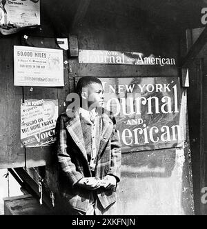 A Harlem newsboy, New York City, April 1943. Stock Photo