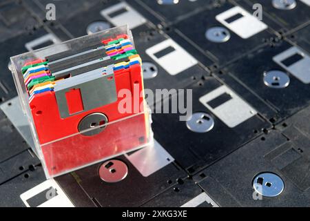 Vintage colored floppy disks. Old technologies. Selective focus. Low DOF Stock Photo