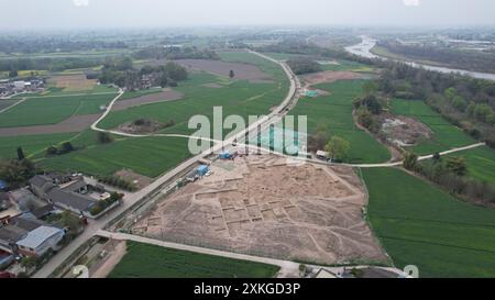 (240723) -- CHENGDU, July 23, 2024 (Xinhua) -- An aerial drone photo taken on March 23, 2024 shows a view of the Sanxingdui Ruins site in Guanghan City, southwest China's Sichuan Province. Archaeological authorities have recently unveiled groundbreaking discoveries, including a jade and stone artifact 'workshop' dating back over 3,400 years, at the legendary Sanxingdui Ruins site. The new finds offer vital insights into the origins of various precious cultural relics and highlight the remarkable achievements of ancient Chinese civilization. (Sichuan cultural relics and archaeology research ins Stock Photo