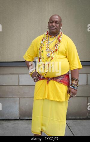 A devout HIndu man with his own unique sense of style. In Queens, New York City. Stock Photo