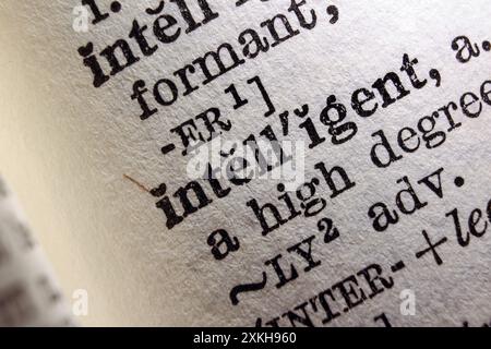 Word intelligent on dictionary page, macro close-up Stock Photo