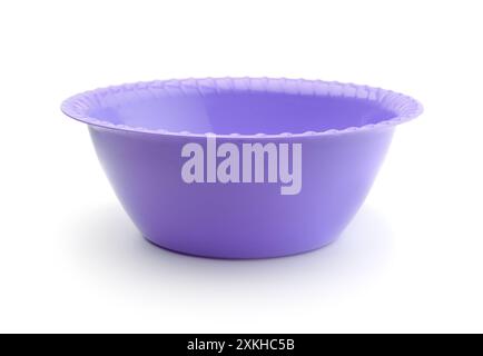 New blue deep plastic plate isolated on white. Stock Photo