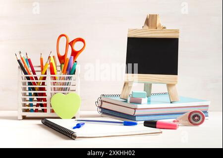Essential supplies to have for a good return to school, to the institute. It is presented on an white background. Stock Photo