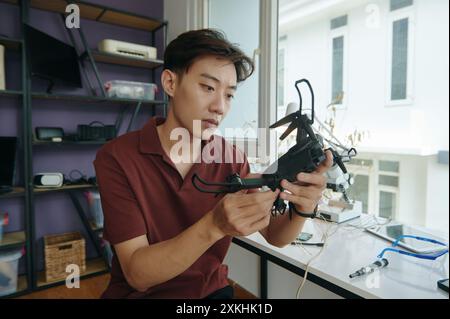 Master Repairing Details Of Drone Stock Photo