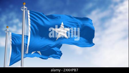 Somalia national flags waving. Light blue with white, five-pointed star at the center. 3D illustration render. Rippling fabric. Selective focus Stock Photo