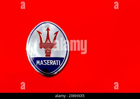 The renown Maserati trident badge proudly affixed to a 1970s Ghibli sportscar designed by Giorgetto Giugiaro when employed at Ghia of Turin. Stock Photo