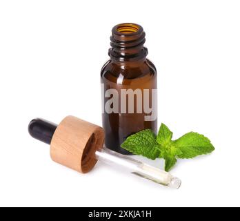 Bottle of essential oil, dropper and mint isolated on white Stock Photo