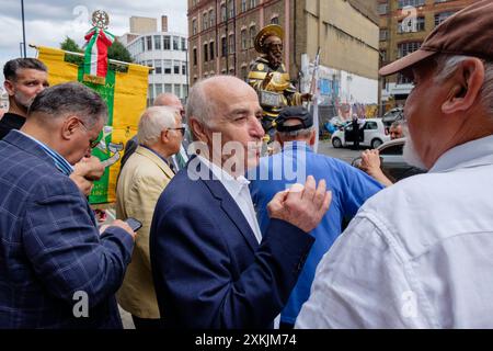 21st July 2024, London, UK. St.Peter's Italian Church, Clerkenwell. Members of the Italian community gather to attend the annual Procession in Honour of Our Lady of Mount Carmel. Pictured: Members of the congregation gather before the start of the procession. Stock Photo