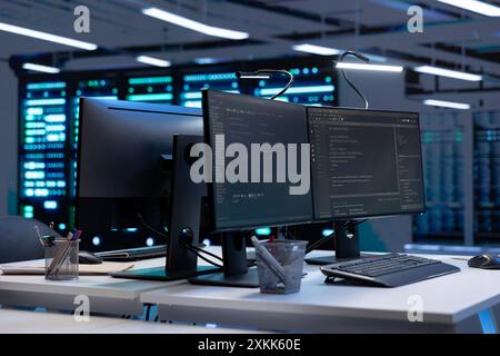 Computers in data center facility used for managing supercomputers hardware energy consumption. Devices used for automation and monitoring processes in server farm, close up shot Stock Photo