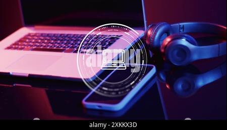 Image of laptop icon over laptop, smartphone and headphones Stock Photo