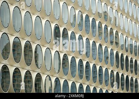 18.06.2023, Netherlands, North Holland, Amsterdam - Circular windows on a modern commercial property in Amsterdam Zuid (South). 00A230618D156CAROEX.JP Stock Photo