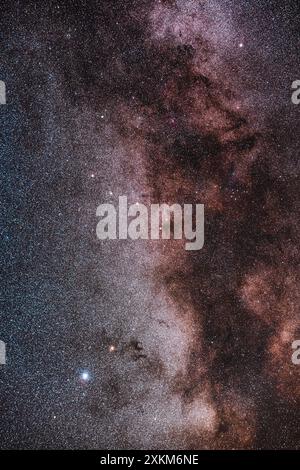 Framing of the Milky Way from the bright star Altair in Aquila (at bottom left) up to Albireo in Cygnus (at top right). In between are the small const Stock Photo
