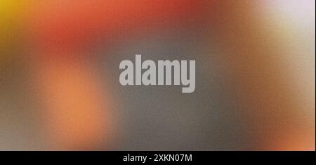 Abstract blurred background with a grainy texture in warm tones of orange, yellow, and gray Stock Photo
