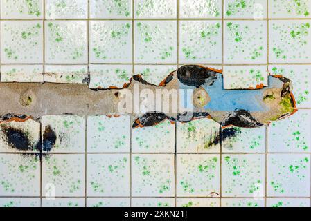 Old Textured White Broken Tiles Background Stock Photo