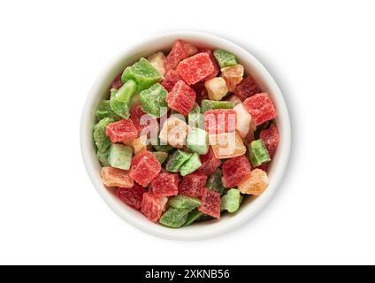 Bowl with dried sweet colorful fruit bites isolated on white background. Stock Photo