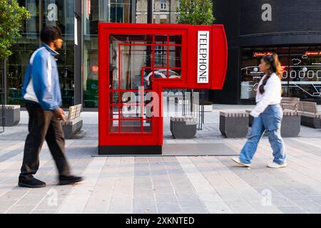 EDITORIAL USE ONLY An art installation of a folded lamppost, bench and telephone box by Jem Hughes at Old Street, London, commissioned by Samsung. Picture date: Wednesday 24th July 2024. The art installation forms a part of a wider art project, Fold Town, by Samsung to mark the release of the Galaxy Z Flip6 and Z Fold6, now with Galaxy AI technology. Photo credit should read: David Parry/PA Media Assignments Stock Photo