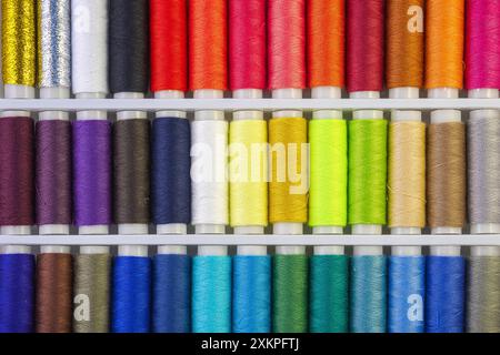 Full frame, sewing threads in different colours Stock Photo