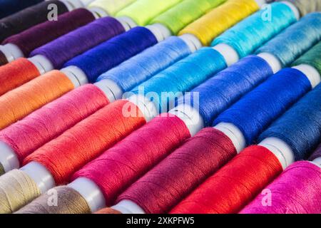 Full frame, sewing threads in different colours Stock Photo