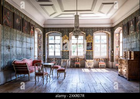 Sunlit drawing room Schloss Dietldorf, Renaissance castle and listed building in Burglengenfeld, Schwandorf, Bavaria, Germany. Stock Photo