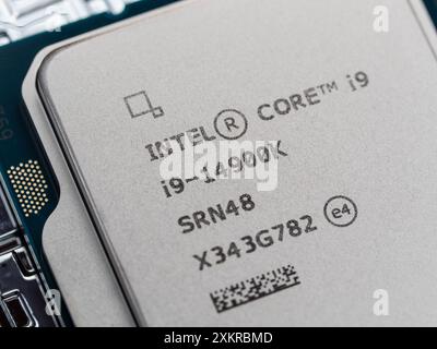 Intel logo on an Intel Core 14th gen i9-14900K processor case, focus on CPU Stock Photo