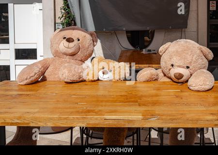 Teddy bears in cafe bar Stock Photo