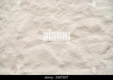 Blank photography of aged beige wall; fence; cement; concrete; abstract; material; obsolete; background; grunge; pattern; textured, crack, peeling, cr Stock Photo