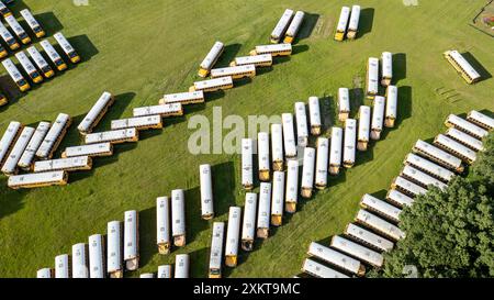 Aerial view of abandoned yellow school buses in Chatham County, just outside of downtown Savannah - Georgia. High-res stock images of Abandoned yellow Stock Photo