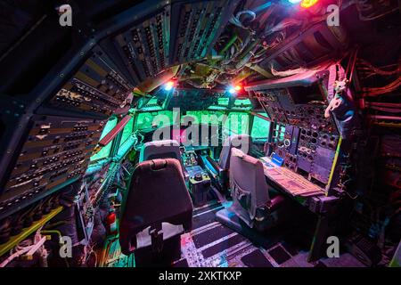 Intricate Military Aircraft Cockpit Wide-Angle View Stock Photo