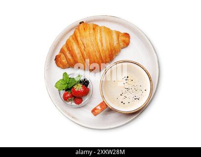 Coffee cup, berries and croissant. Flat lay. Isolated on white background Stock Photo