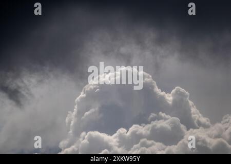 Storm cloud formation background in shades of grey and white Stock Photo