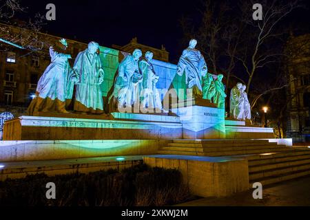 Kossuth Lajos monument at Parliament building on the same named square in night illumination, Budapest, Hungary Stock Photo