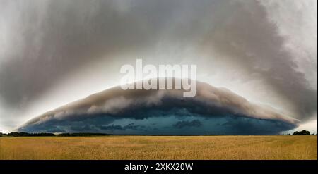 Supercell, shelf, arcus storm clouds over the fields in summer Stock Photo