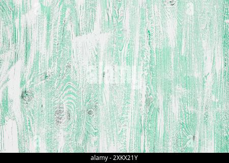 Light green mint wooden background in a cool tone. Wood texture with vertical stripes and knots for wallpaper, graphic design, creativity. Top view, h Stock Photo