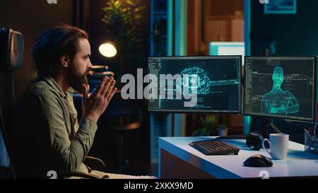 Man unable to believe eyes after seeing AI gaining humanoid form and consciousness, waving hand to salute him. Computer scientist surprised by artificial intelligence greeting him unprompted, camera A Stock Photo