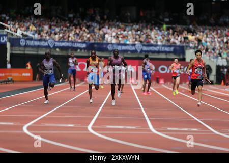 Eugene AMO-DADZIE (Great Britain), Nsikak EKPO (Netherlands, Holland), Jerome BLAKE (Canada), Koki UEYAMA (Japan) on the final leg of the Men's 4 x 100m Relay Final at the 2024, IAAF Diamond League, London Stadium, Queen Elizabeth Olympic Park, Stratford, London, UK. Stock Photo