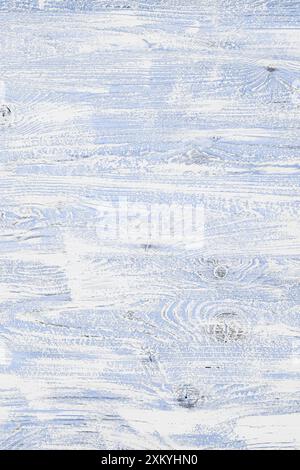 Light lilac wooden background in cool tone. Wood texture with horizontal stripes and knots for wallpaper, graphic design, creativity. Top view, vertic Stock Photo