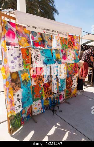 Handmade natural silk market stall / stalls selling scarf / scarves to tourists, on display on promenade. Following Splitska Riva Split, Croatia (138) Stock Photo
