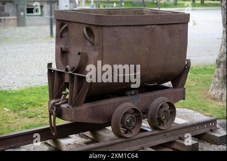 tipping wagon, Decauville wagon from the iron ore mine in the upper Eisental, on display in front of the railroad station in Bayerisch Eisenstein Stock Photo