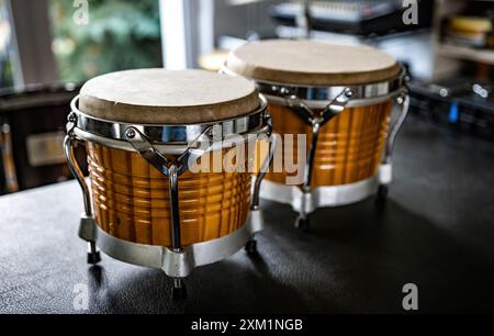 Bongos drums in recording studio for hard beat perfomance. Professional musical instrument for rock and pop show Stock Photo